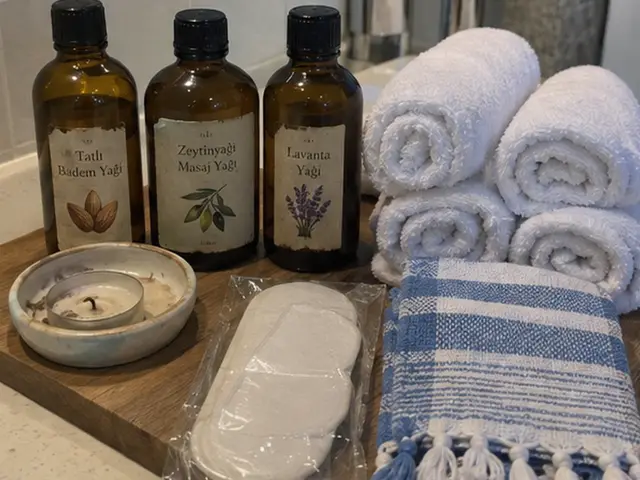 Tatlı badem, zeytinyağı ve lavanta masaj yağları, rulo havlular ve peştemal — Cebeci, Masaj Salonun